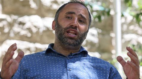 Palestinian human rights activist charged under .